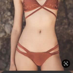 Two swim tops, 1 bottom. O'Neill and Victoria's Se